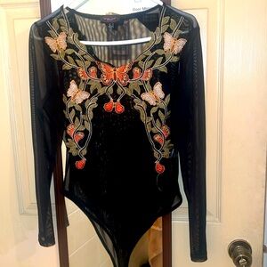 Flowered bodysuit with flowers and a few mesh back